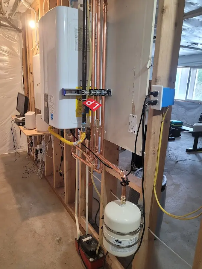 Licensed plumber repairing a kitchen sink in Hopatcong